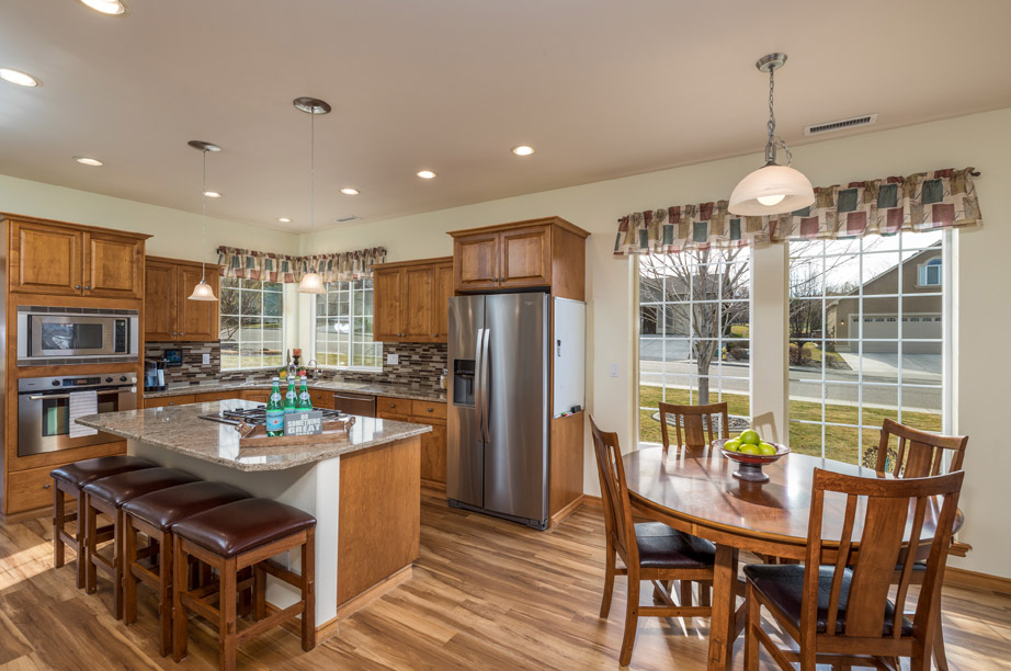 Kitchen with Dining Room and Windows 5